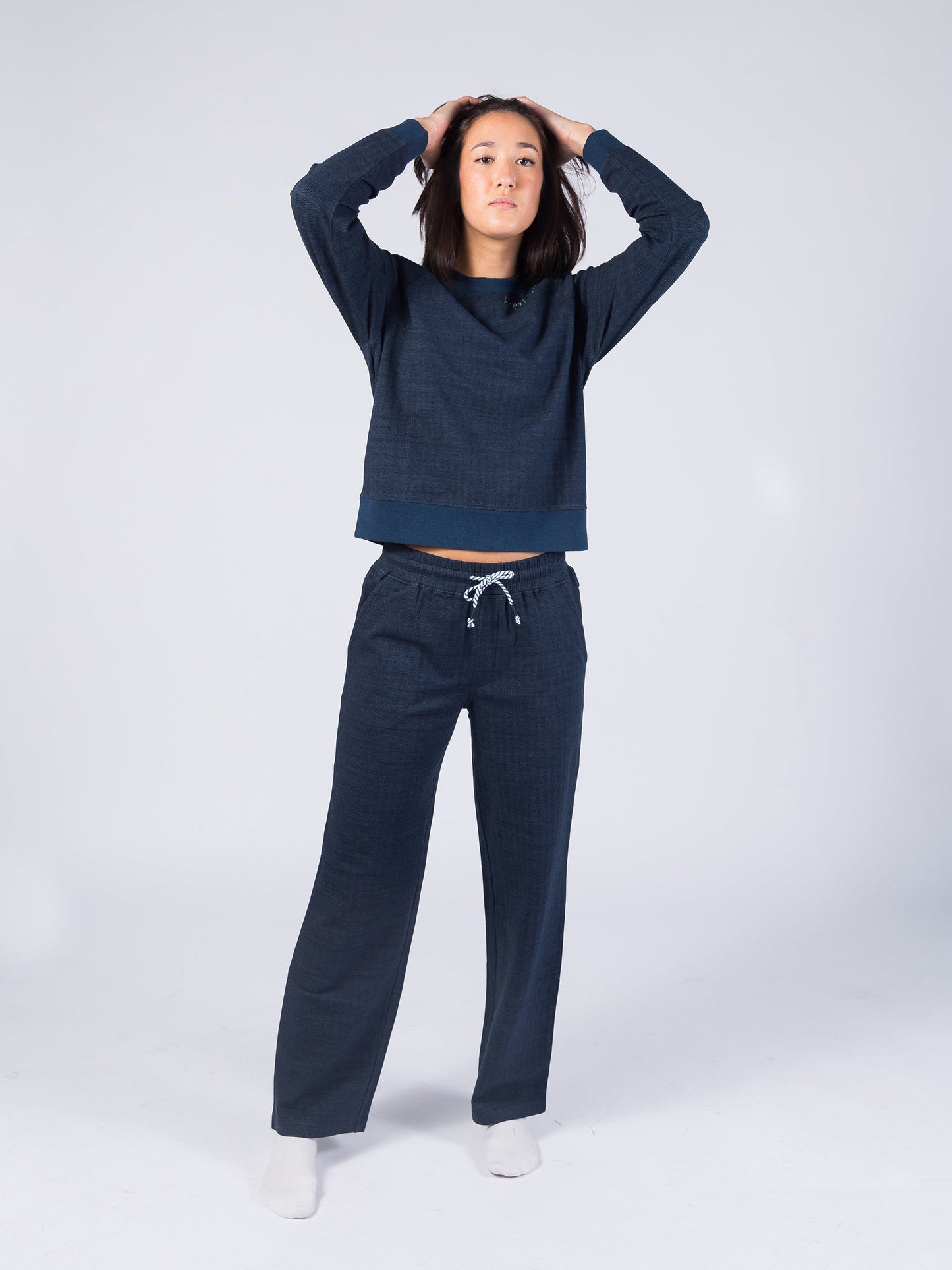 wide leg herringbone flex pants | deep sea by happy earth