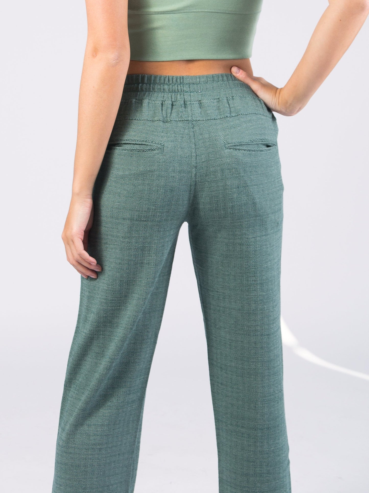 wide leg herringbone flex pants | calathea green by happy earth