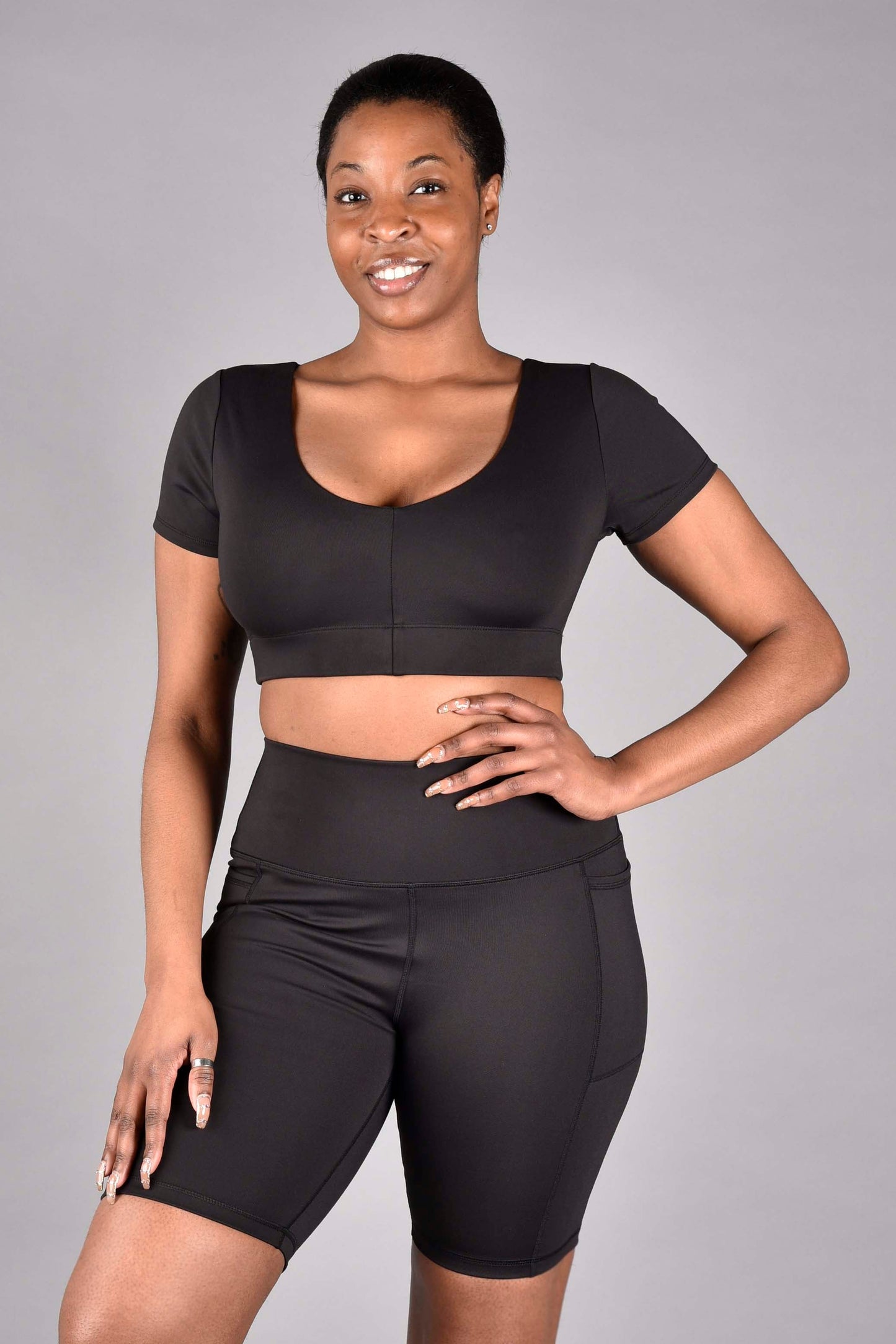 audrey reversible recycled core compression short sleeve longline bra in matte black by wear love more