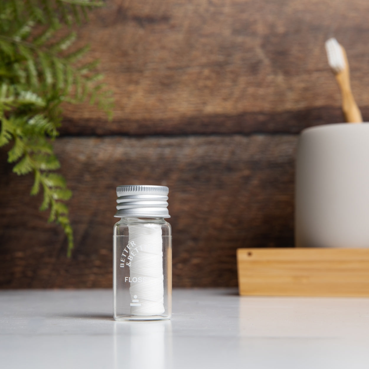 natural floss in glass jar by better & better