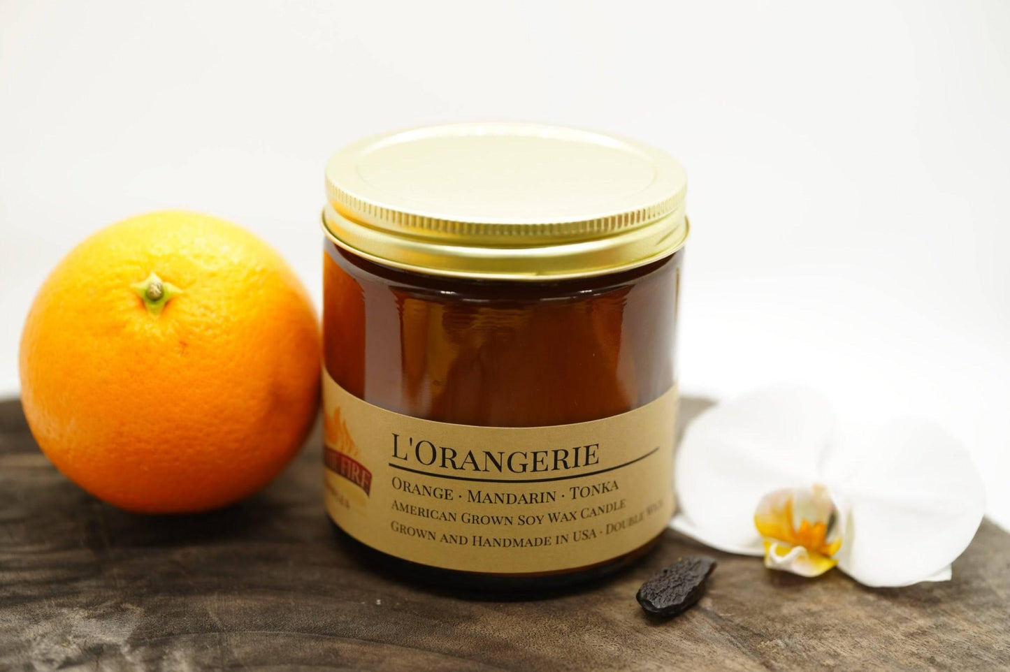 l'orangerie soy wax candle | 16 oz double wick amber apothecary jar by prairie fire tallow, candles, and lavender