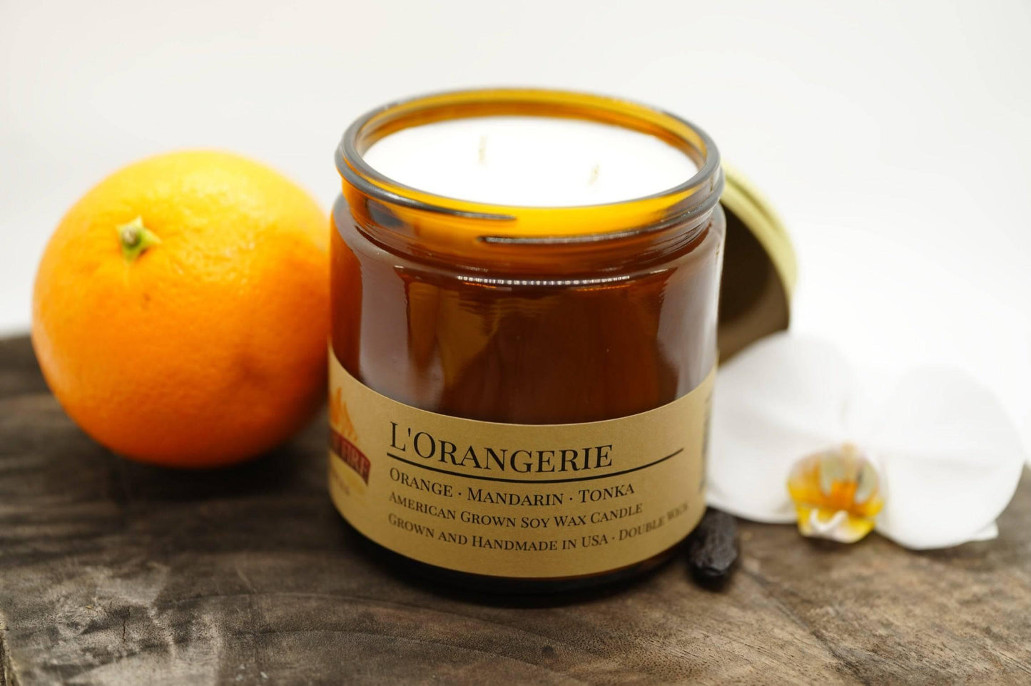 l'orangerie soy wax candle | 16 oz double wick amber apothecary jar by prairie fire tallow, candles, and lavender