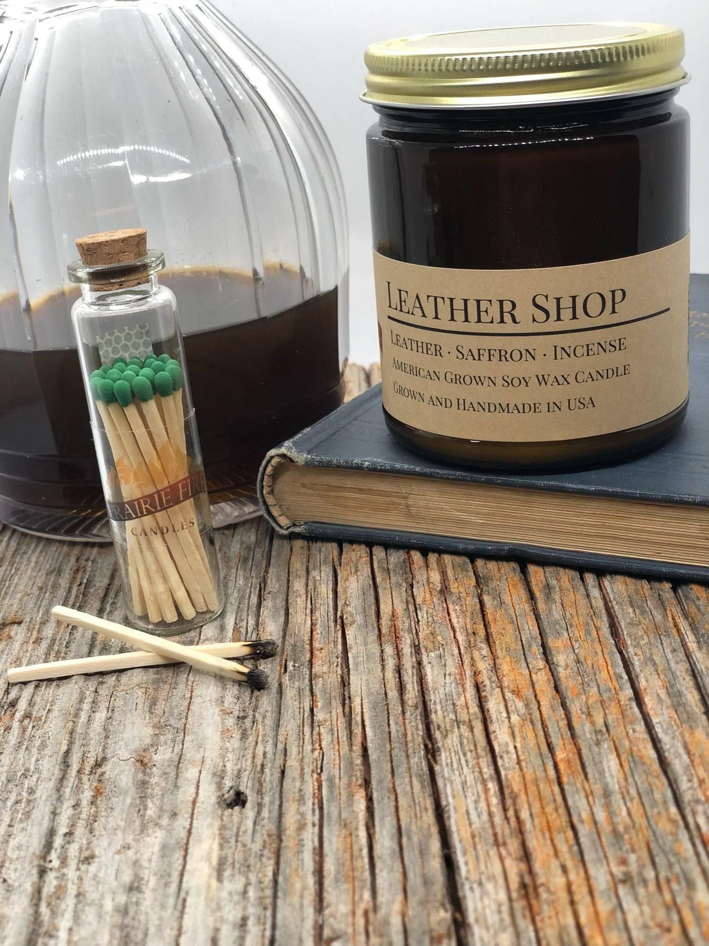 leather shop soy wax candle | 9 oz amber apothecary jar by prairie fire tallow, candles, and lavender