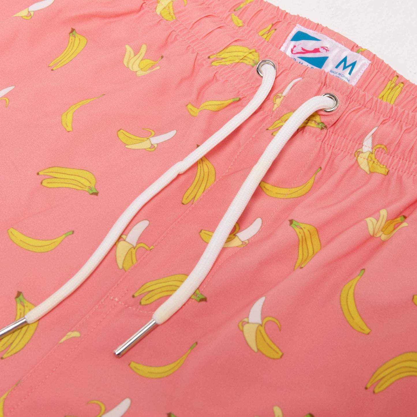 pink banana - 5" swim trunks by bermies